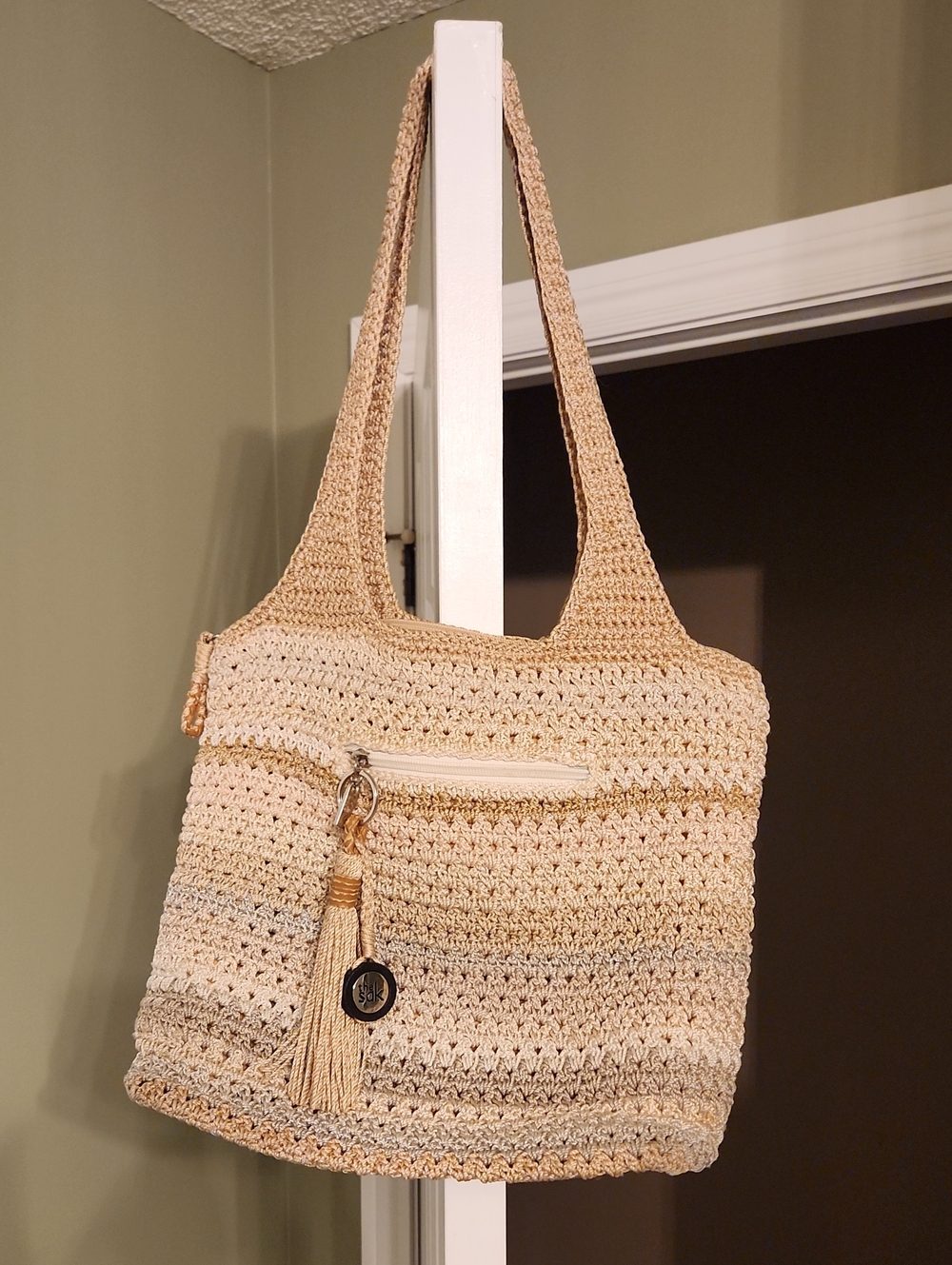 The Sak Neutral Crochet Shoulder Bag with Tassel